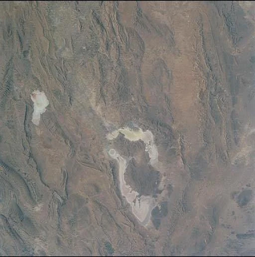 Aerial view of Bakhtegan Lake in Iran showing water bodies and arid terrain with visible water areas in different shades