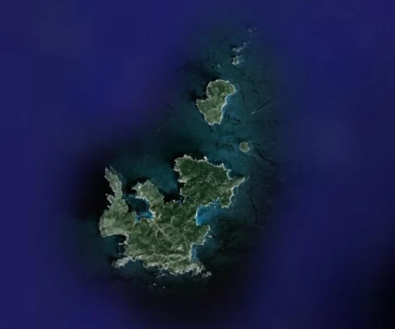 Satellite image of green islands and deep blue sea in the Cabrera Archipelago National Park