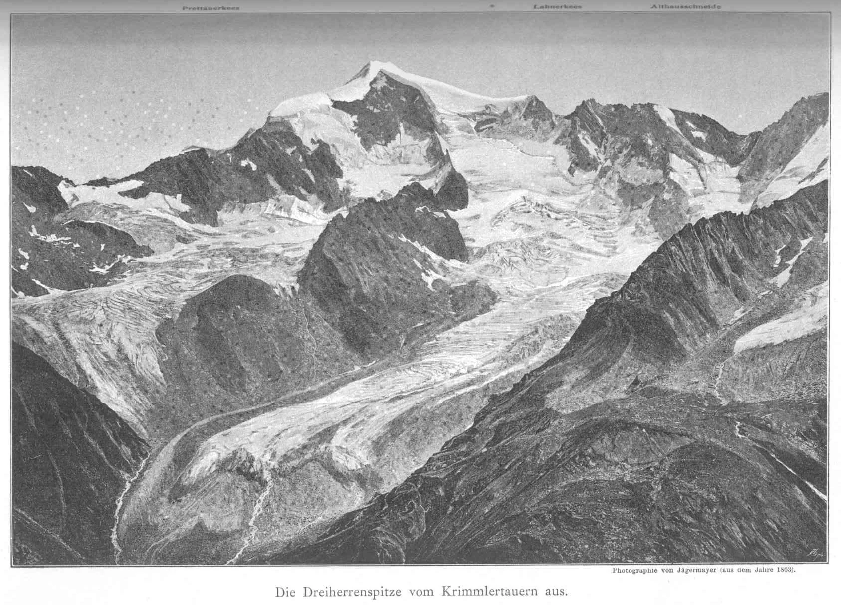 Black-and-white photograph of Dreiherrnspitze mountain peak with glaciers and rocky terrain in the Hohe Tauern range