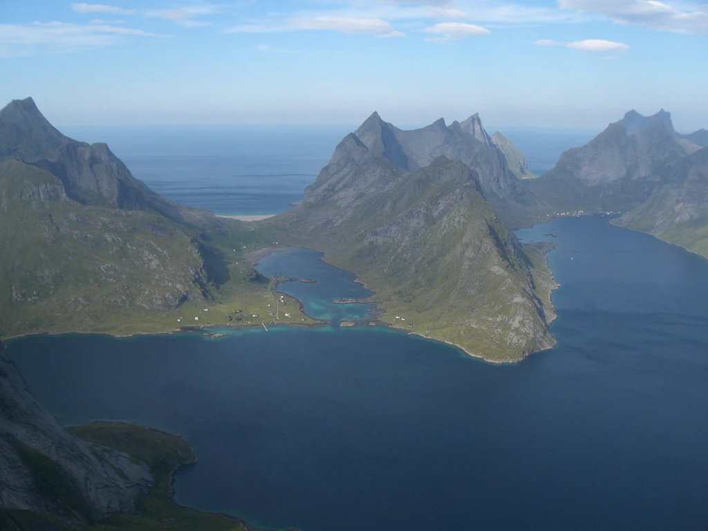 Aerial view of multiple fjords surrounded by mountainous terrain in Lofoten Islands, Norway