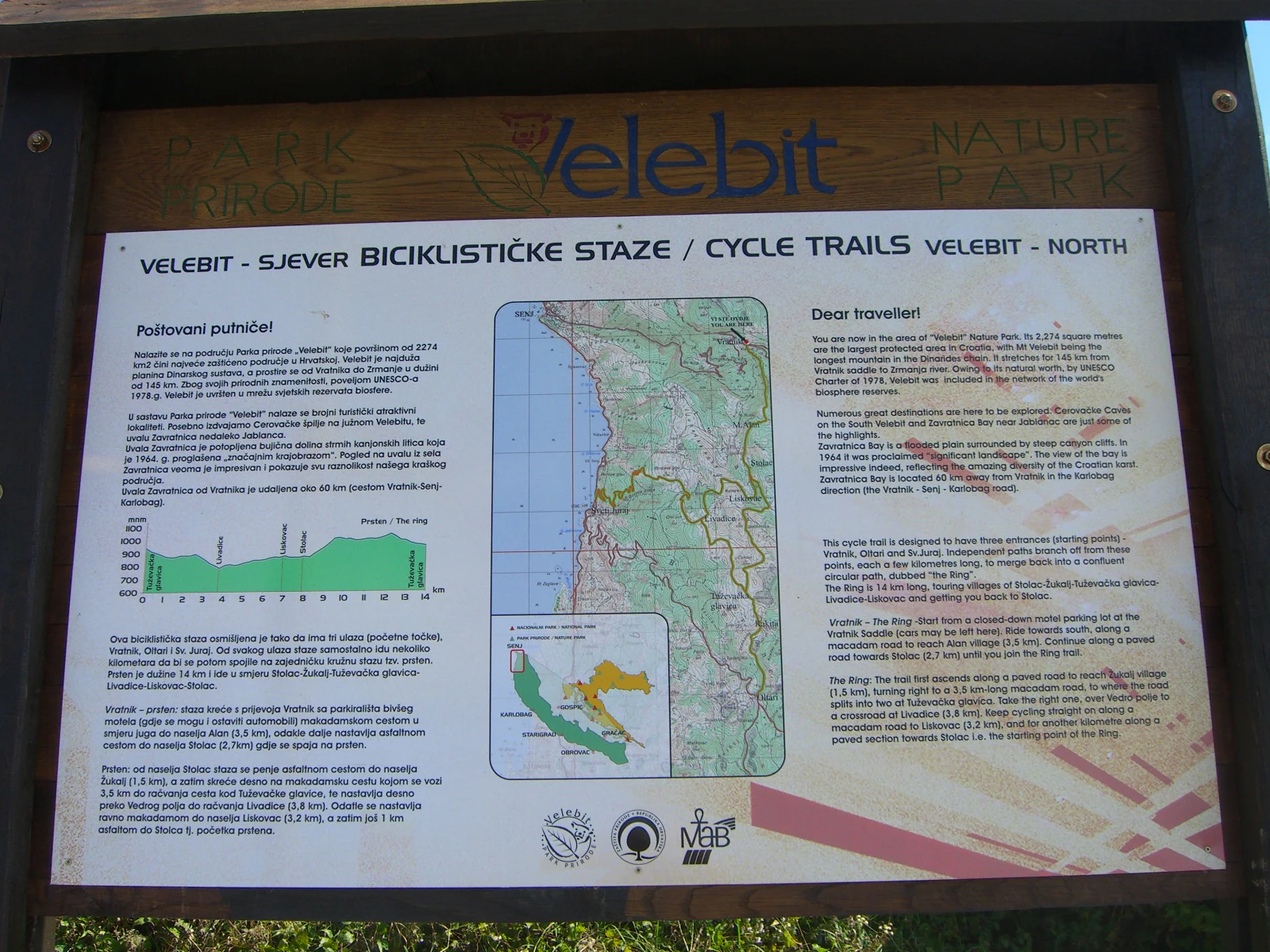 Information signboard displaying park details including text, map, and logos about Northern Velebit National Park