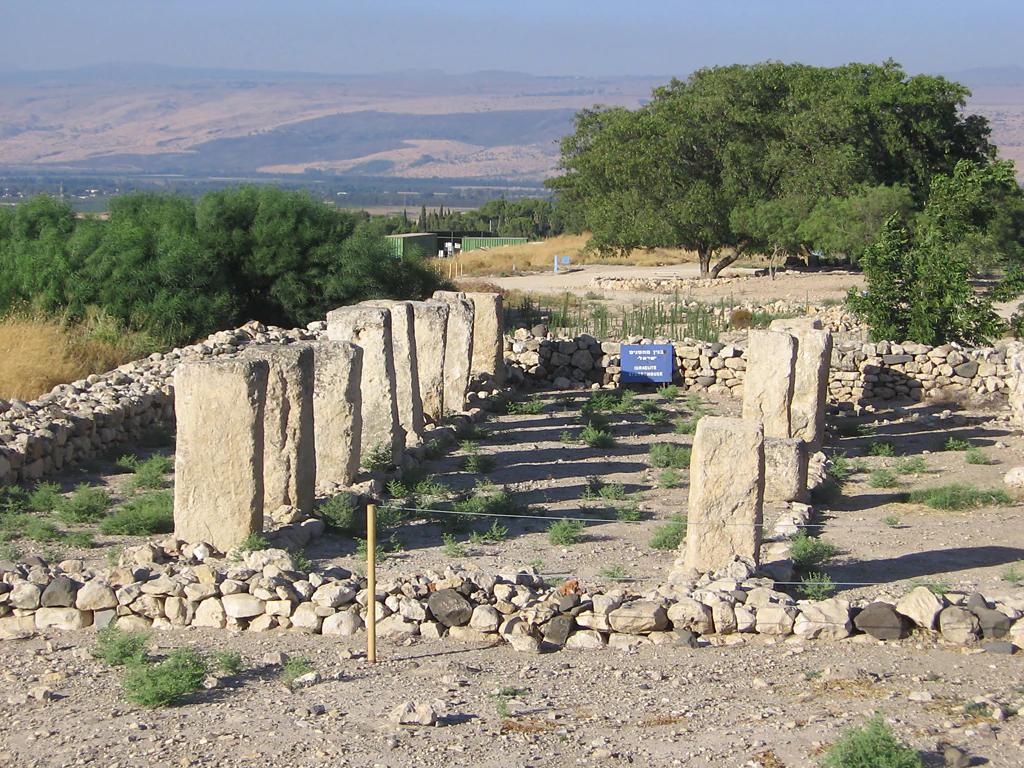 Archaeological ruins of the House of Pillars with standing stone columns at Tel Hazor National Park.