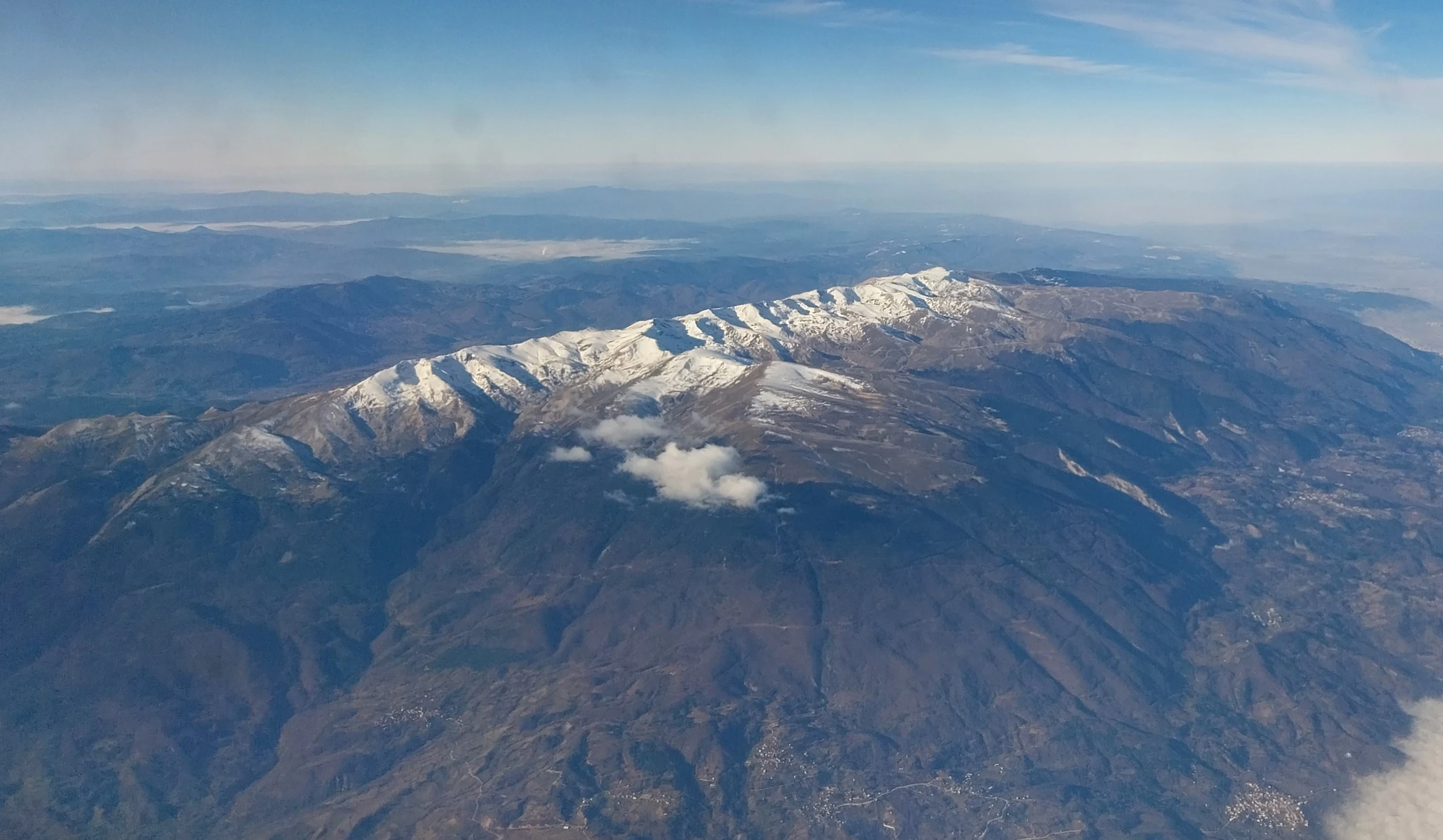Aerial view of Uludağ National Park showing mountain peaks, valleys, and the city of Bursa