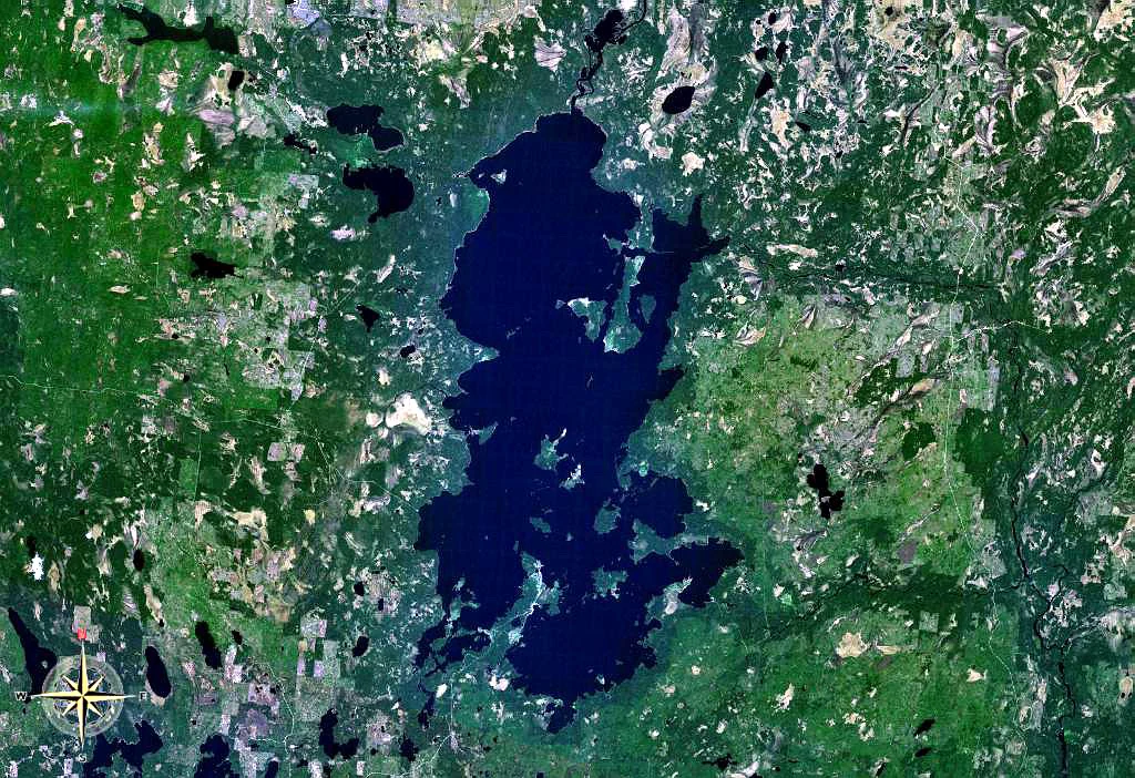 Satellite image showing Lake Vodlozero surrounded by forested land and smaller lakes