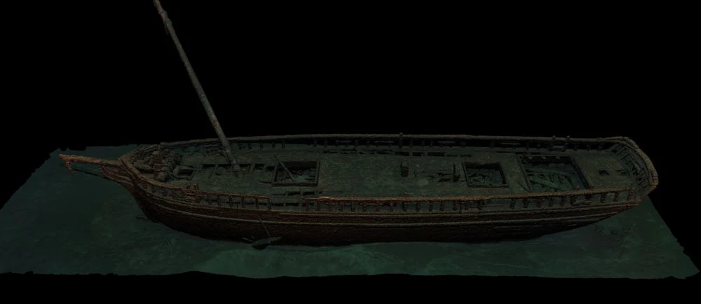 Una reconstrucción digital en 3D de un naufragio de goleta de madera sobre un fondo negro.