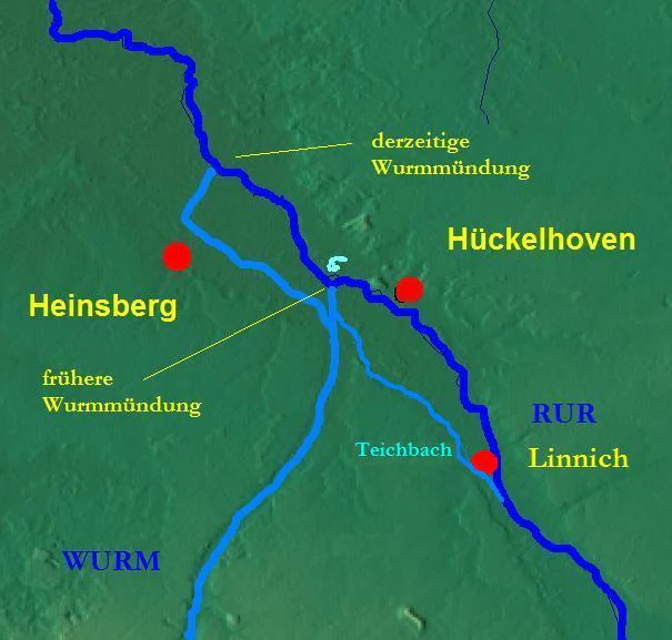 A stylized map showing the rivers Wurm and Rur, with text labels in German indicating locations such as Heinsberg, Hückelhoven, Linnich, and river mouth points.