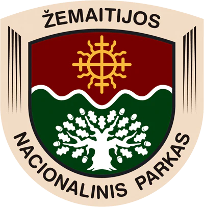 Emblem of Žemaitija National Park featuring shield with tree, waves, and sun symbol, text 'ŽEMAITIJOS NACIONALINIS PARKAS'